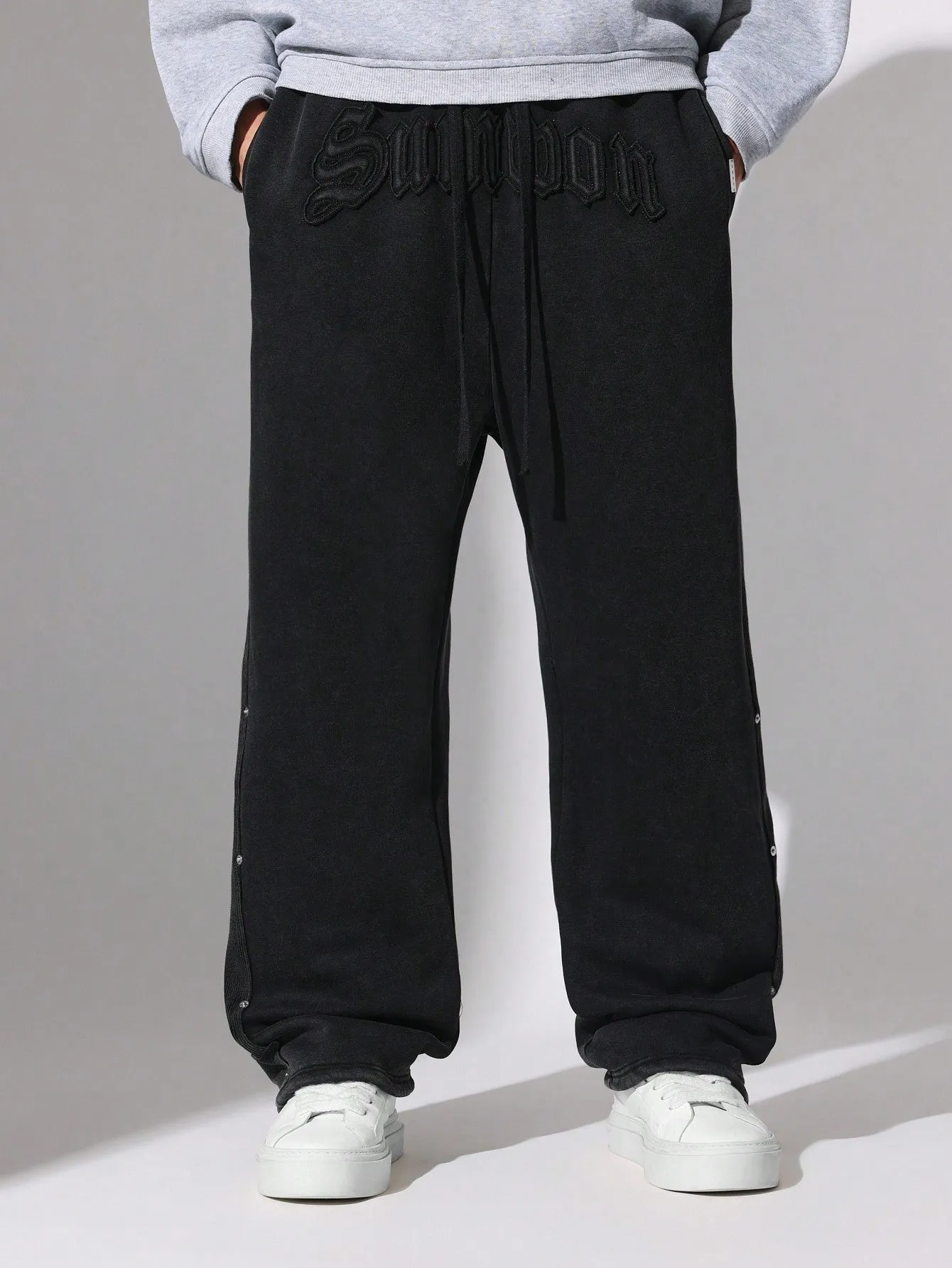 Washed Drop Crotch Sweatpants With Rivet Panel & Embroidered Applique